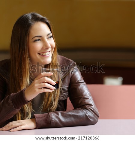 stock photo happy pensive woman refreshing with a drink in a restaurant and looking sideways 217120366 Sugars Babies And Sugar Baby Dating Web page