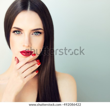 http://thumb9.shutterstock.com/display_pic_with_logo/1054231/492086422/stock-photo-beautiful-brunette-model-girl-with-long-shine-hair-red-lips-and-nails-manicure-492086422.jpg