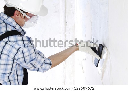 work aligns with a spatula wall - stock photo
