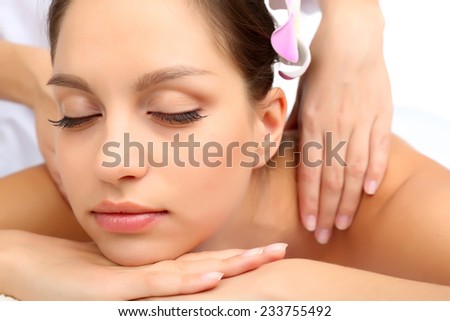 Masseur+Search Masseur doing massage on woman body in the spa salon. Beauty treatment ...