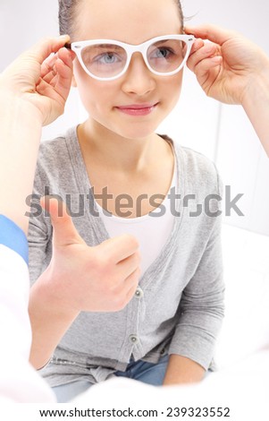 stock-photo-vision-test-a-child-an-ophthalmologist-portrait-of-a-girl-at-an-ophthalmologist-239323552.jpg
