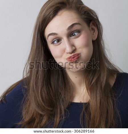 http://thumb9.shutterstock.com/display_pic_with_logo/1494092/306289166/stock-photo-humor-concept-portrait-of-a-cross-eyed-young-woman-pouting-having-fun-in-practicing-a-funny-face-306289166.jpg
