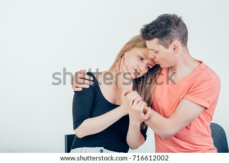 http://thumb9.shutterstock.com/display_pic_with_logo/162859956/716612002/stock-photo-young-tender-husband-hugging-his-wife-loving-man-embracing-woman-gently-and-tightly-sitting-on-716612002.jpg