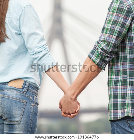http://thumb9.shutterstock.com/display_pic_with_logo/1672675/191364776/stock-photo-couple-holding-hands-couple-holding-hands-while-walking-along-quay-191364776.jpg