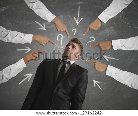 Concept of accused businessman with with fingers pointing - stock photo