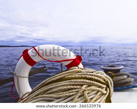 stock-photo-lifebuoy-winch-halyard-on-th