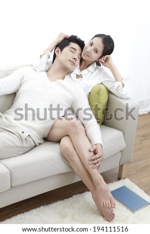 http://thumb9.shutterstock.com/display_pic_with_logo/2277758/194111516/stock-photo-asian-couple-on-couch-194111516.jpg
