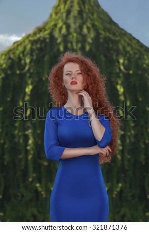 german Blue dress redhead