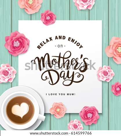 Flat lay style mother`s day greeting card with coffee cup and flowers on wooden table. Flat lay style mother`s day greeting card with coffee cup and flowers on wooden table.