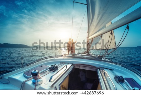 http://thumb9.shutterstock.com/display_pic_with_logo/295900/442687696/stock-photo-young-couple-enjoying-sunset-on-the-yacht-in-andaman-sea-442687696.jpg