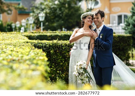 stock photo stylish rich cute couple on the background spring garden 282677972