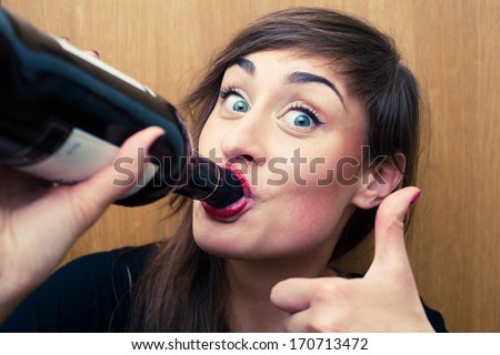 stock-photo-young-woman-drinking-wine-17