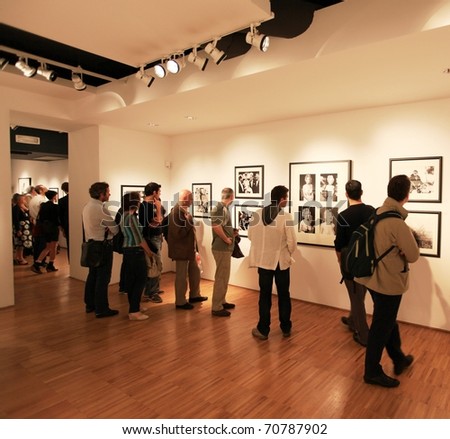 stock-photo-milan-italy-june-people-look-at-phil-stern-photography-collection-during-his-on-the-scene-70787902.jpg