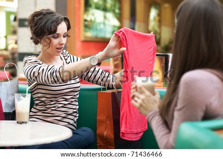 shopping-mall-pretty-hispanic-woman-doing-some-clothing-store-34346868.jpg