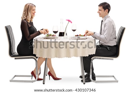 http://thumb9.shutterstock.com/display_pic_with_logo/3391/430107346/stock-photo-young-man-and-woman-eating-on-a-date-seated-at-a-restaurant-table-isolated-on-white-background-430107346.jpg