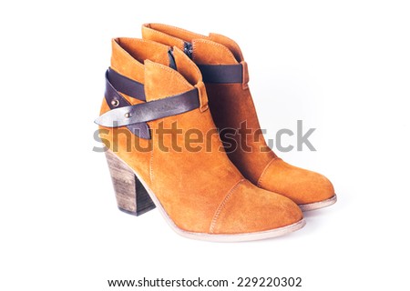 Brown suede shoes isolated on white background - stock photo