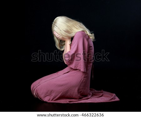 http://thumb9.shutterstock.com/display_pic_with_logo/3644120/466322636/stock-photo-beautiful-blonde-haired-woman-wearing-a-long-flowing-purple-dress-kneeling-on-the-ground-466322636.jpg