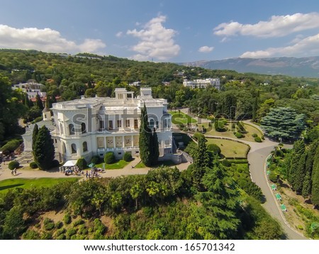 YALTA - AUG 29: Green trees around the Livadia Palace on August 29, 2013 in Yalta, Ukraine. View from unmanned quadrocopter. - stock photo