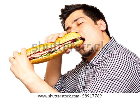 stock-photo-young-man-eating-a-freshly-made-sub-meat-feast-sandwich-isolated-on-white-58917769.jpg