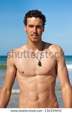 -young-handsome-muscular-man-in-a-bathing-suit-hanging-on-the-beach ... -young-handsome-muscular-man-in-a-bathing-suit-hanging-on-the-beach ...