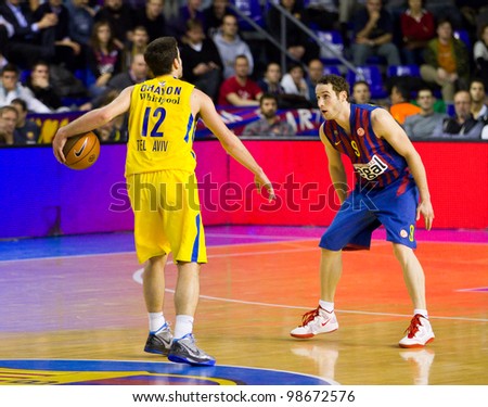  - stock-photo-barcelona-february-yogev-ohayon-l-and-marcelinho-huertas-during-the-euroleague-basketball-98672576