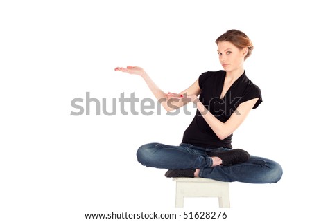stock-photo-young-woman-sitting-on-chair-and-presenting-your-product ... stock-photo-young-woman-sitting-on-chair-and-presenting-your-product ...