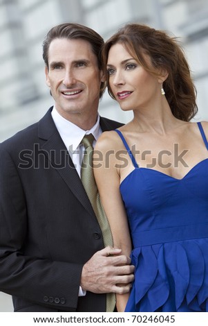 stock photo successful and happy man and woman couple in smart clothes 70246045