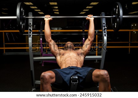 stock-photo-weight-lifter-at-the-bench-press-lifting-a-barbell-on-an-incline-bench-245915032.jpg