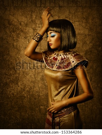 Stock Photo Beautiful Egyptian Woman Bronze Portrait Over Grunge Dark Gold Background 153364286