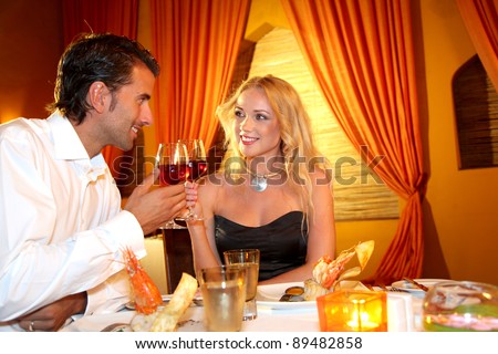 http://thumb9.shutterstock.com/display_pic_with_logo/624661/624661,1322075917,12/stock-photo-couple-dining-in-a-fancy-restaurant-89482858.jpg