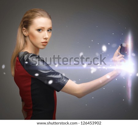 stock-photo-picture-of-futuristic-woman-with-access-card-126453902.jpg