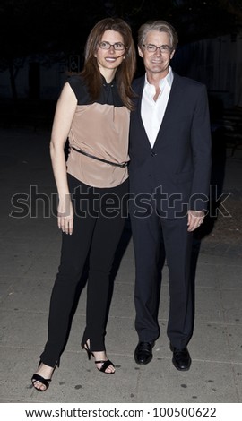  - stock-photo-new-york-april-desiree-gruber-and-kyle-maclachlan-attend-the-vanity-fair-party-during-100500622