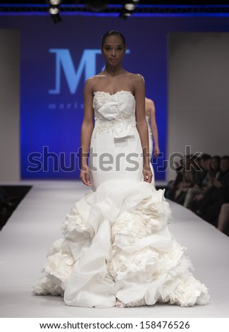  - stock-photo-new-york-october-model-walks-runway-for-maria-karin-during-bridal-week-at-pier-on-october-158476526