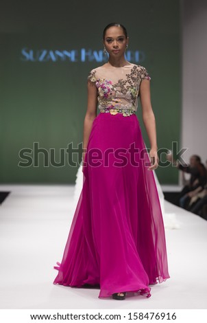 - stock-photo-new-york-october-model-walks-runway-for-suzanne-harward-during-bridal-week-at-pier-on-158476916