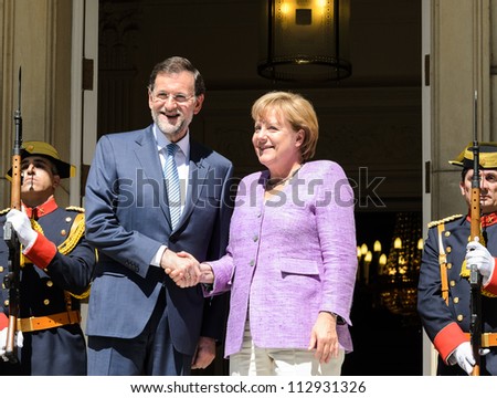  - stock-photo-madrid-spain-september-spanish-prime-minister-mariano-rajoy-receives-german-chancellor-112931326