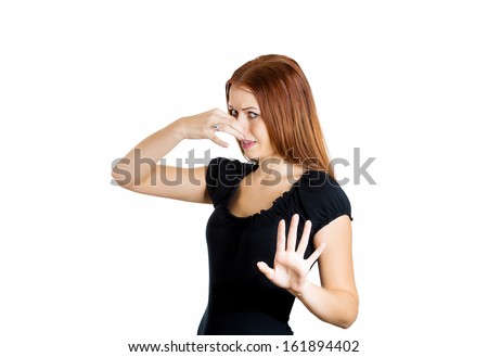 stock-photo-closeup-portrait-of-a-young-beautiful-woman-who-covers-her-nose-looks-away-something-stinks-very-161894402.jpg