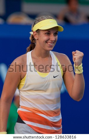  - stock-photo-pattaya-thailand-february-sabine-lisicki-of-germany-reacts-after-winning-quarter-final-round-128633816