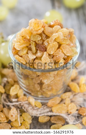 Portion of dried Grapes with some fresh fruits - stock photo