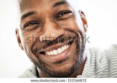 stock-photo-close-up-portrait-of-a-happy-black-man-in-his-s-isolated-on-a-white-background-151566872.jpg