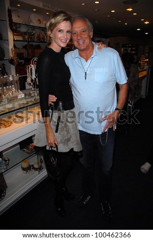  - stock-photo-kylie-bax-and-neal-cohen-at-the-launch-of-kylie-bax-and-spiros-poros-moro-moro-kids-boot-100462366