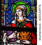 Small photo of BRUSSELS, BELGIUM - MARCH 13, 2017: Stained Glass in the Church of Sablon in Brussels, Belgium, depicting Saint Elizabeth, Queen of Hungary, a symbol of Christian charity.