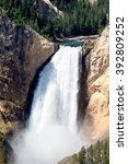 Small photo of People are standing on a platform next to the Lower Falls on the Yellowstone River. Yellowstone National Park, Wyoming, USA
