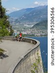 Small photo of a couple make a break over the lake - portrait format