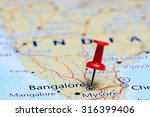 Small photo of Bangalore pinned on a map of Asia
