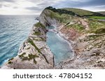 bay and cliffs in south england ...