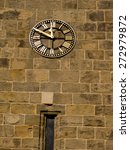 clock on tower wall at all...