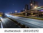 cars through the city at night.