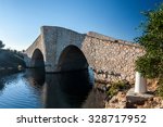 small stone river bridge with...