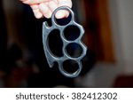 Small photo of Holding brass knuckles as a corpus delicti