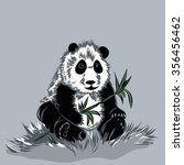 panda sits with bamboo sprig